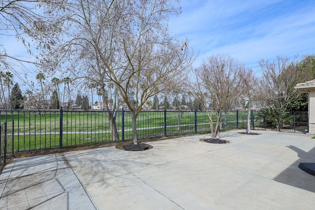 view of patio featuring fence