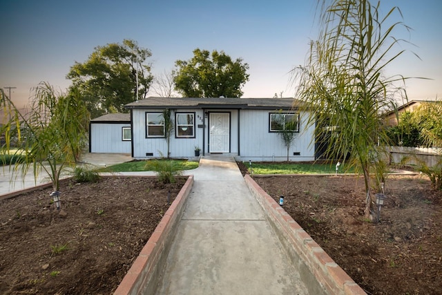 ranch-style home with crawl space and fence