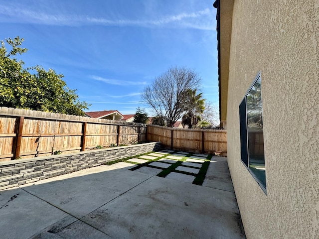 view of patio with a fenced backyard