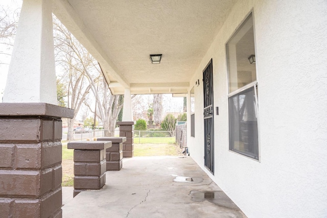 view of patio / terrace with fence