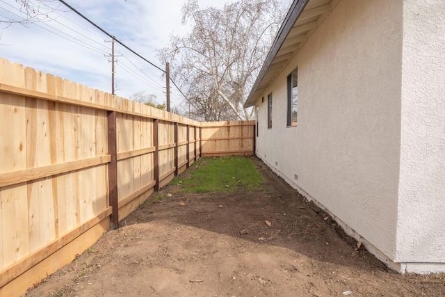 view of yard featuring a fenced backyard