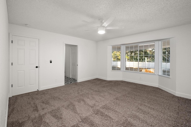 42906 Ranger Circle Dr Drive, Coarsegold, CA 93614 - carpeted spare room with ceiling fan, baseboards, and a textured ceiling