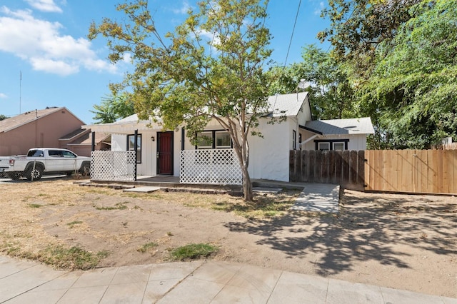 view of front of house with fence