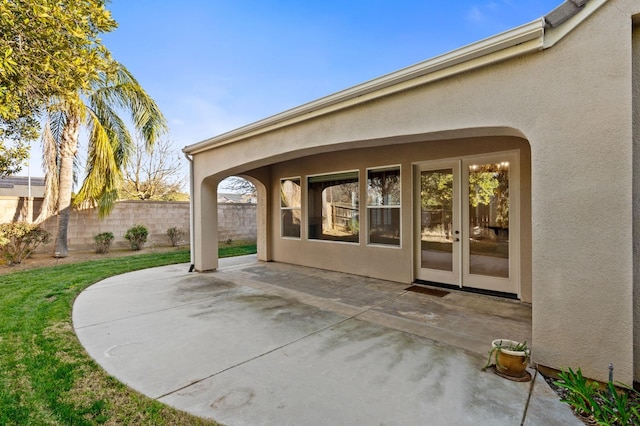 view of patio featuring fence