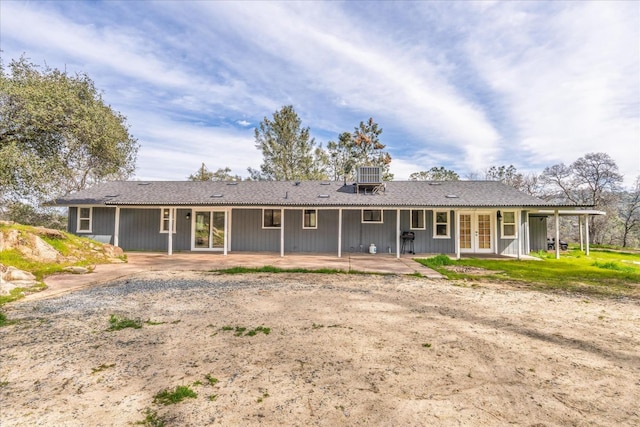 29598 Jim Bowie Ct, Coarsegold, CA 93614 - rear view of property featuring central air condition unit, a patio, and french doors