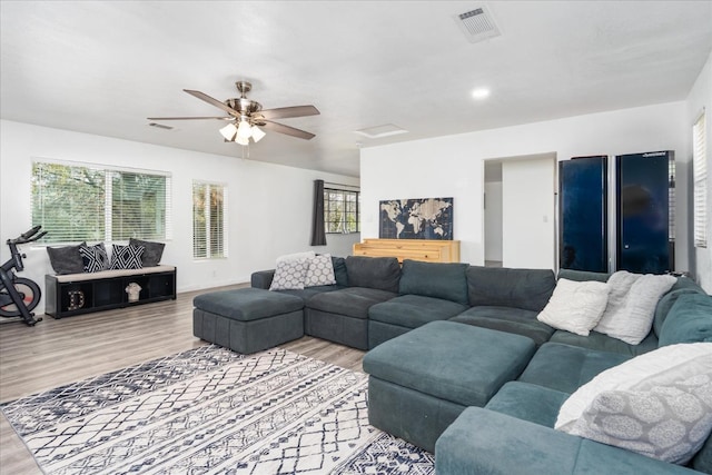29598 Jim Bowie Ct, Coarsegold, CA 93614 - living area with visible vents, ceiling fan, baseboards, and wood finished floors