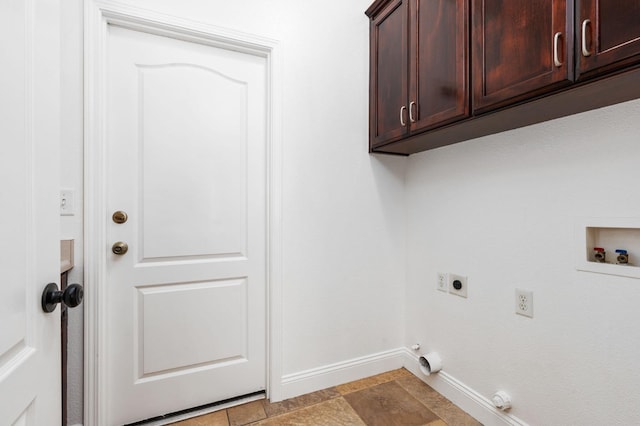 laundry room with cabinet space, baseboards, hookup for a gas dryer, hookup for an electric dryer, and washer hookup