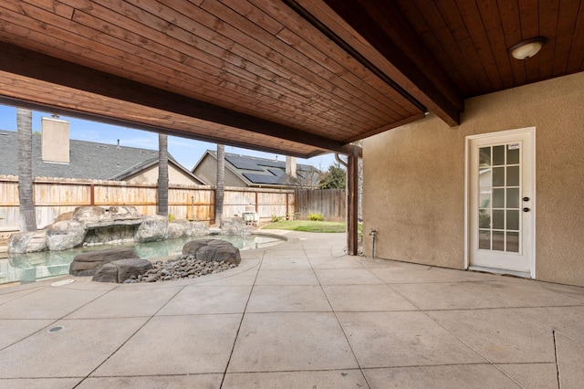 view of patio with a fenced backyard