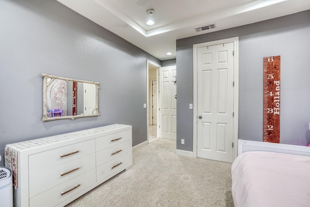 bedroom with recessed lighting, light carpet, visible vents, and baseboards