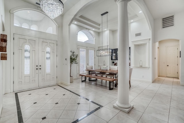 entrance foyer with an inviting chandelier, visible vents, baseboards, and recessed lighting