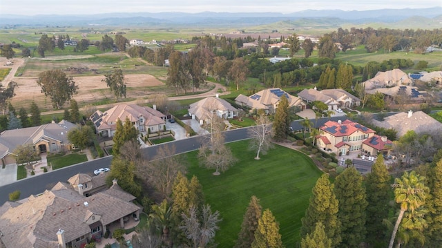 bird's eye view with a mountain view and a residential view