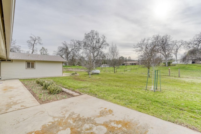 view of yard with a patio area and fence