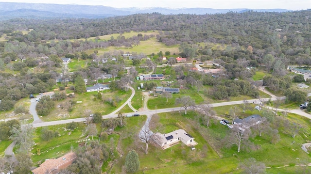 bird's eye view featuring a view of trees