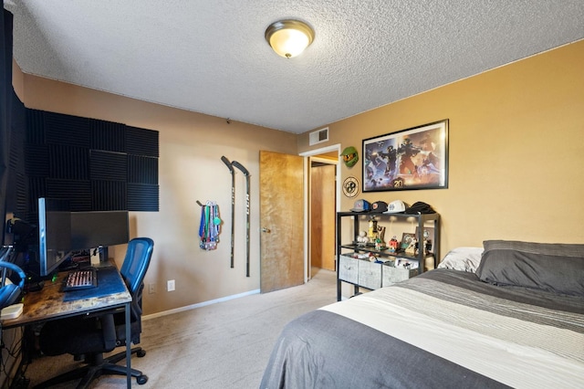 carpeted bedroom with a textured ceiling, visible vents, and baseboards