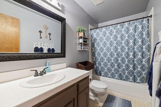 bathroom featuring shower / bath combination with curtain, visible vents, vanity, and toilet