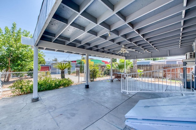 view of patio featuring fence