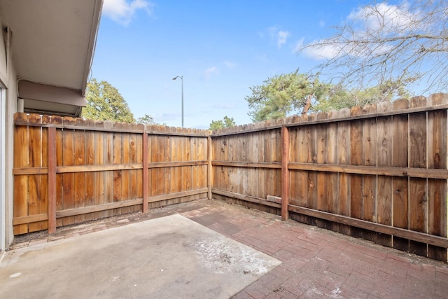 view of patio / terrace with fence