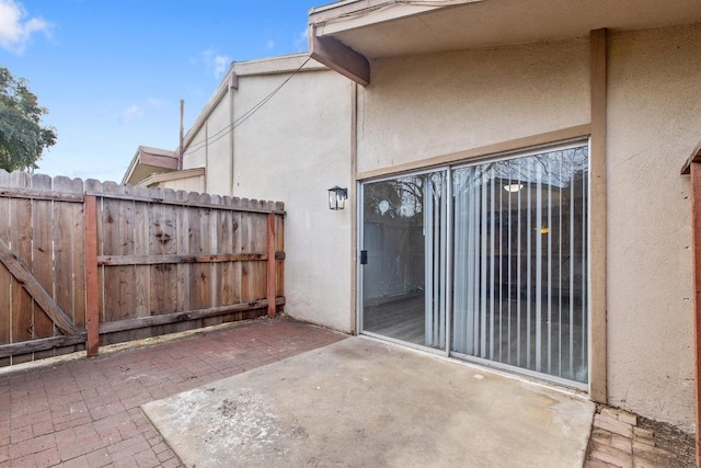 view of patio with fence