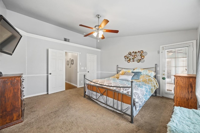 bedroom with ceiling fan, carpet floors, visible vents, and baseboards