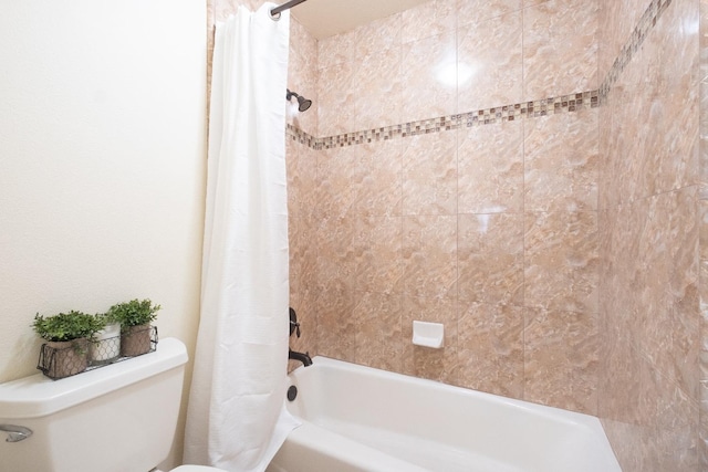 full bathroom featuring shower / tub combo and toilet