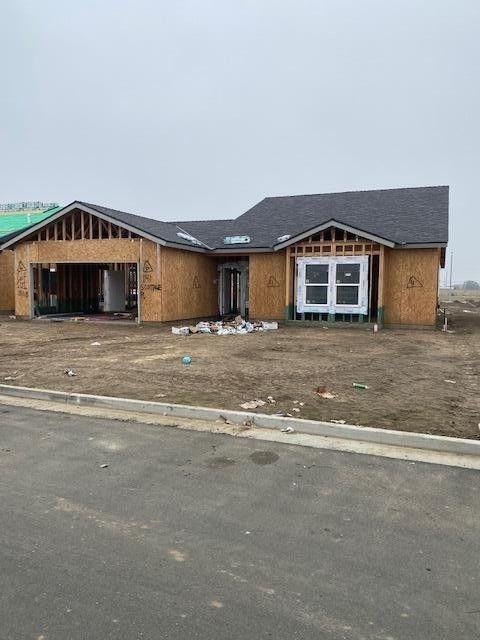 property in mid-construction featuring an attached garage