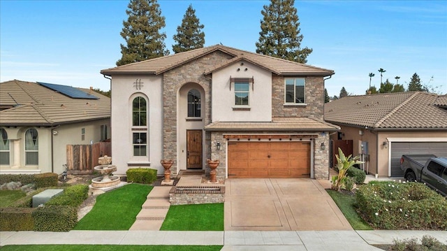 view of front of home with stone siding, concrete driveway, a tiled roof, and stucco siding