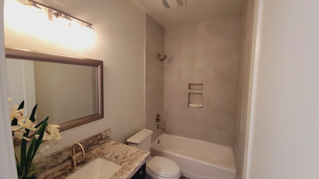 full bath featuring shower / bathing tub combination, visible vents, toilet, and vanity