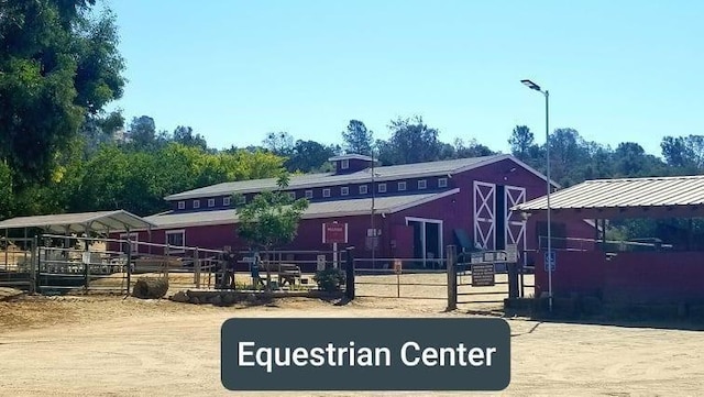 29030 Crystal Spings Ct, Coarsegold, CA 93614 - view of playground with an outbuilding, fence, and a barn