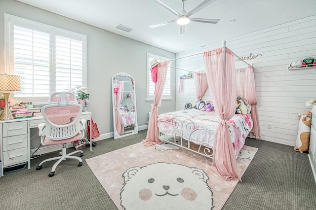 bedroom with carpet floors, visible vents, ceiling fan, and baseboards