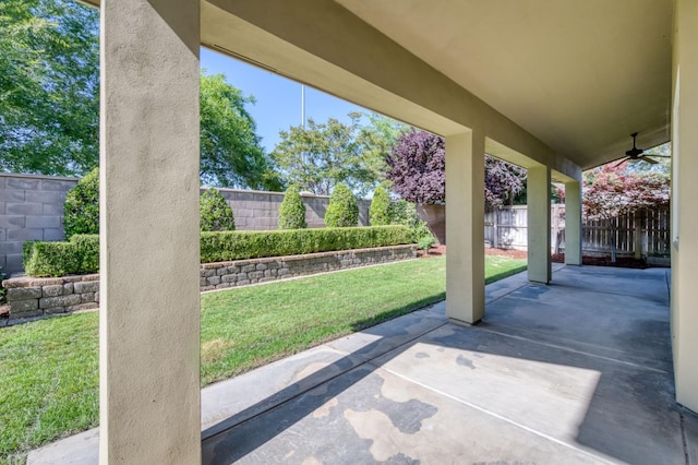 view of patio / terrace with a fenced backyard and ceiling fan