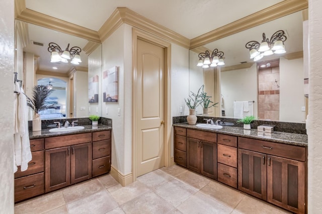 full bathroom featuring two vanities, a sink, visible vents, and crown molding