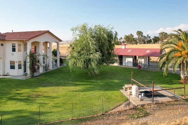 view of yard with an exterior structure