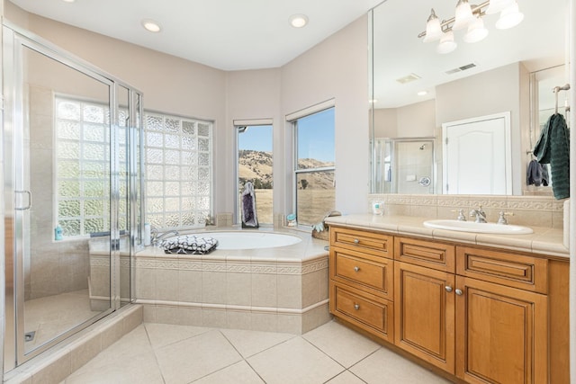 full bath with visible vents, a garden tub, a shower stall, and tile patterned floors