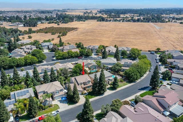 birds eye view of property featuring a residential view and a rural view