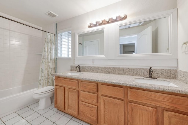 full bath featuring tile patterned flooring, visible vents, a sink, and toilet