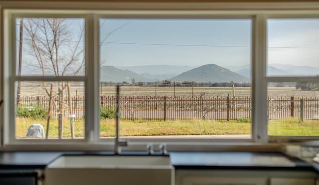 view of mountain feature featuring a rural view