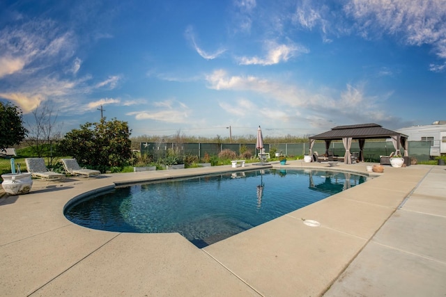 view of pool featuring a gazebo, a patio area, fence, and a fenced in pool