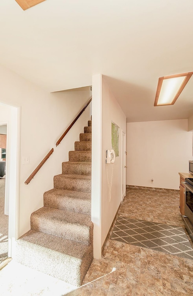 stairway with a wood stove