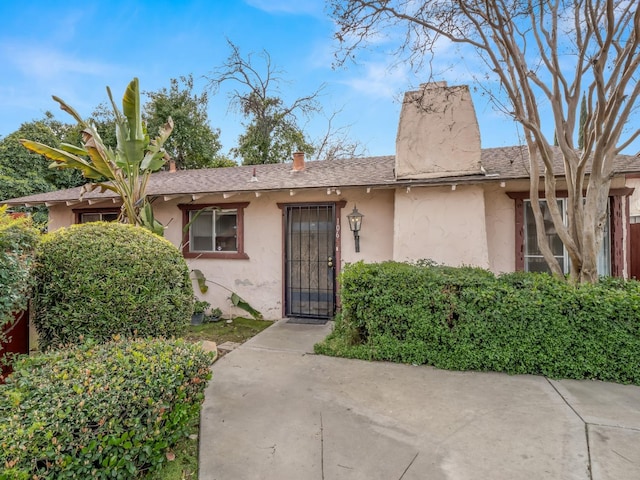2103 N Price Ave Unit 106, Fresno, CA 93703 - doorway to property with stucco siding