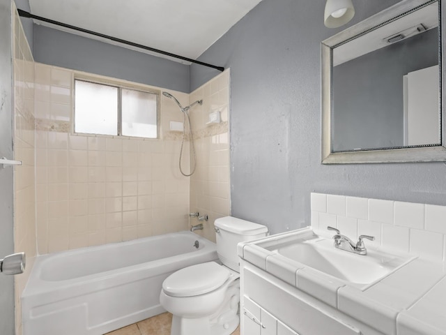 2103 N Price Ave Unit 106, Fresno, CA 93703 - full bath featuring toilet, shower / bathtub combination, vanity, a textured wall, and tile patterned flooring
