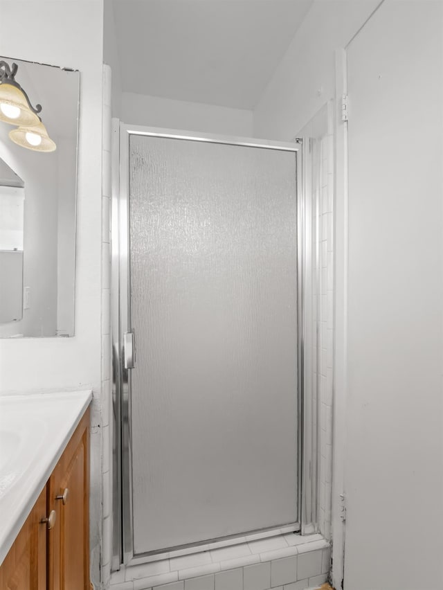 2103 N Price Ave Unit 106, Fresno, CA 93703 - full bathroom featuring vanity and a shower stall