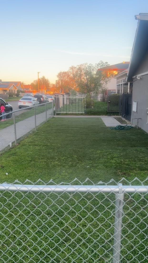 view of yard featuring fence