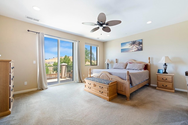 bedroom with access to outside, carpet flooring, visible vents, and baseboards