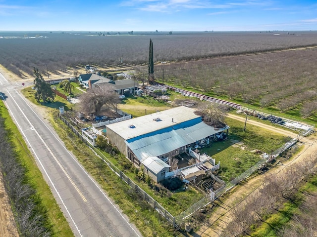 birds eye view of property featuring a rural view