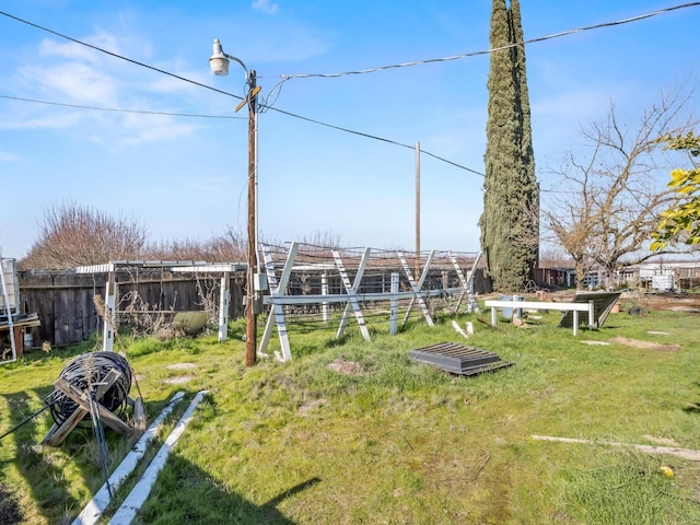 view of yard with fence