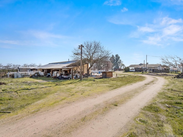 view of road with driveway