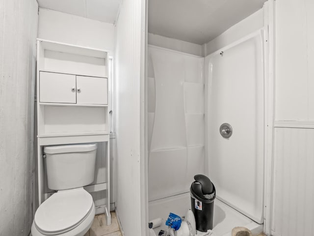 full bath featuring a shower and toilet