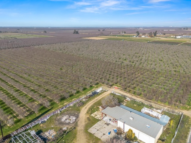 birds eye view of property featuring a rural view