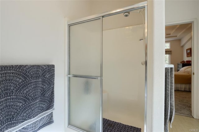 full bath featuring a stall shower and ensuite bath