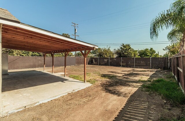 view of yard featuring a fenced backyard and a patio